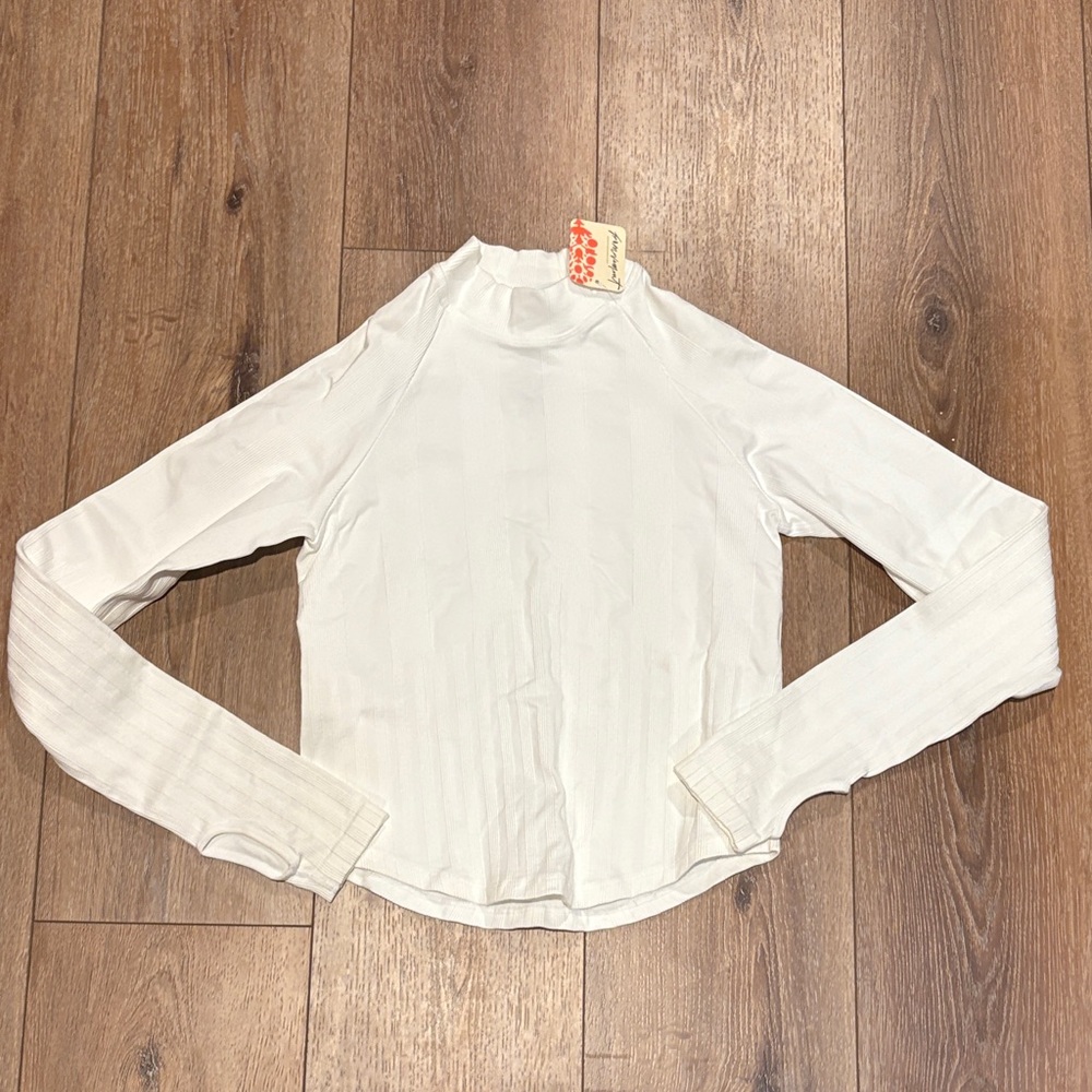 NWT Free people movement women’s white long sleeve workout shirt XS small cutout